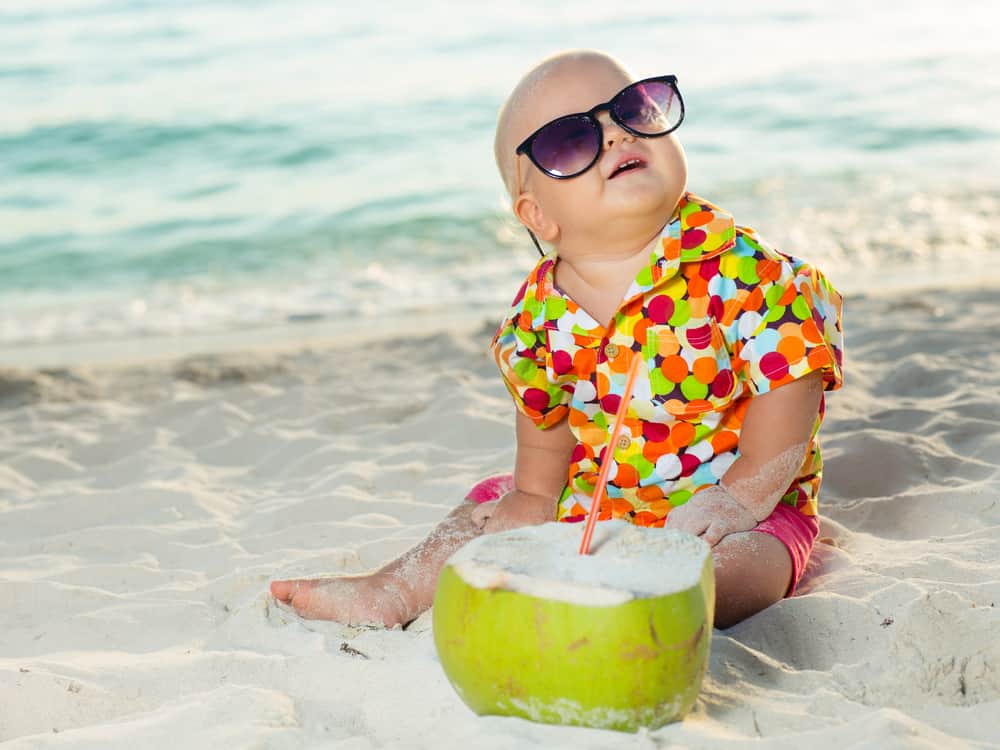 funny baby wearing sunglasses coconut